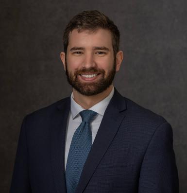 Adam K. Woelke Profile
