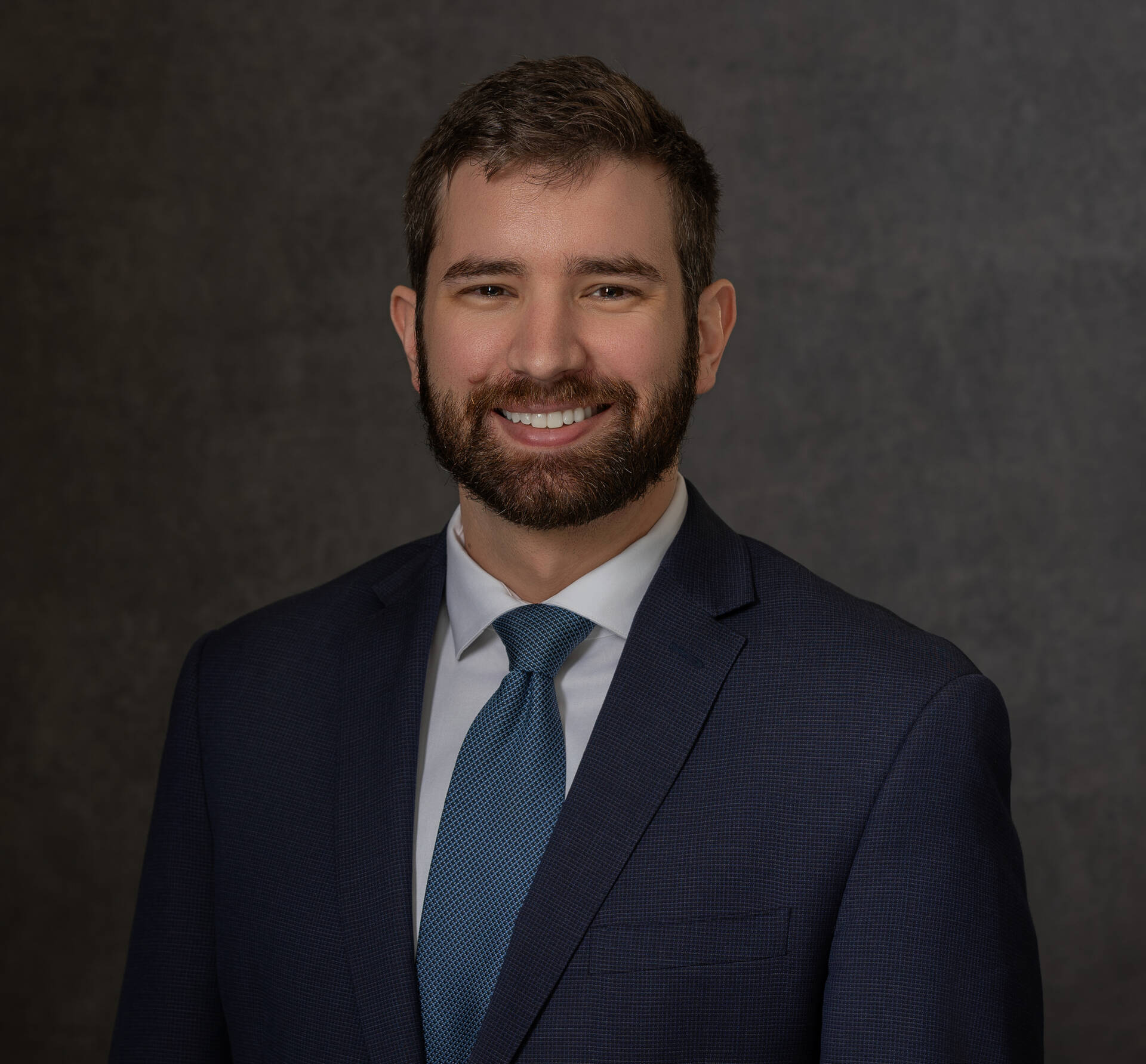 Adam K. Woelke
